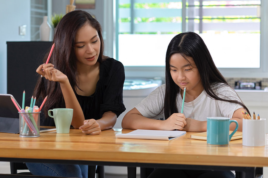 student and tutor together at a desk in Fort Lauderdale